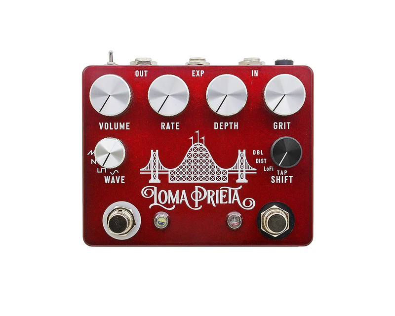 A CopperSound Loma Prieta Gritty Harmonic Tremolo pedal with buttons and knobs for overdrive.
