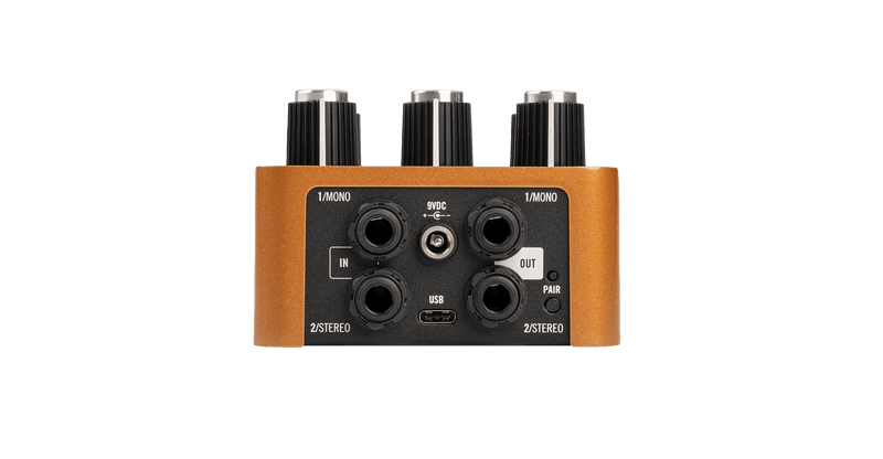 The Universal Audio Woodrow '55 Instrument Amplifier, a three-channel audio interface, delivers exceptional tape echo and delay effects on a clean white background.