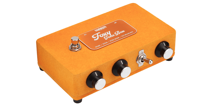 A Warm Audio Foxy Tone Box Fuzz guitar pedal with black knobs featuring premium parts.