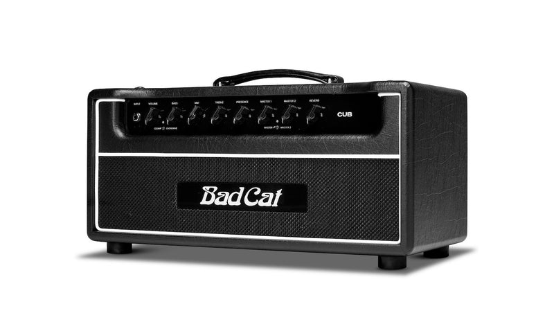 A stack of Bad Cat Cub guitar amps, equipped with gain mode, sitting on top of a table.