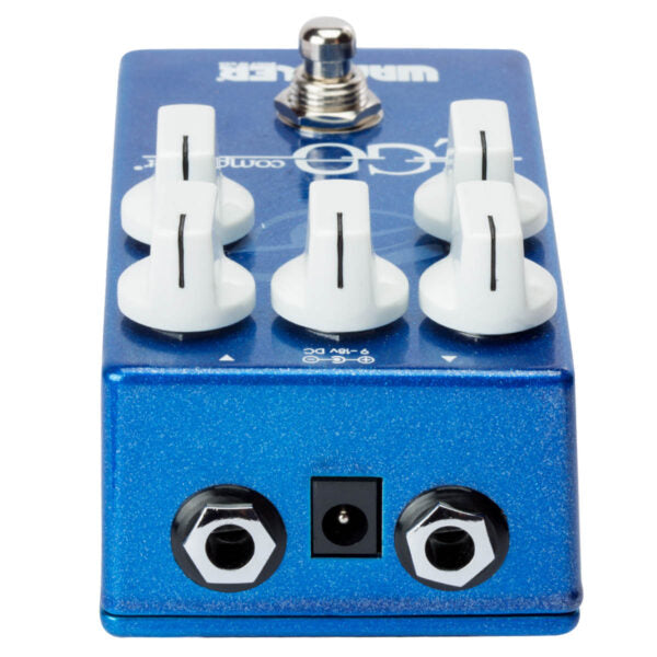 A Wampler Ego Compressor V2 guitar pedal with four knobs on it, offering control over compressor and sustain effects.