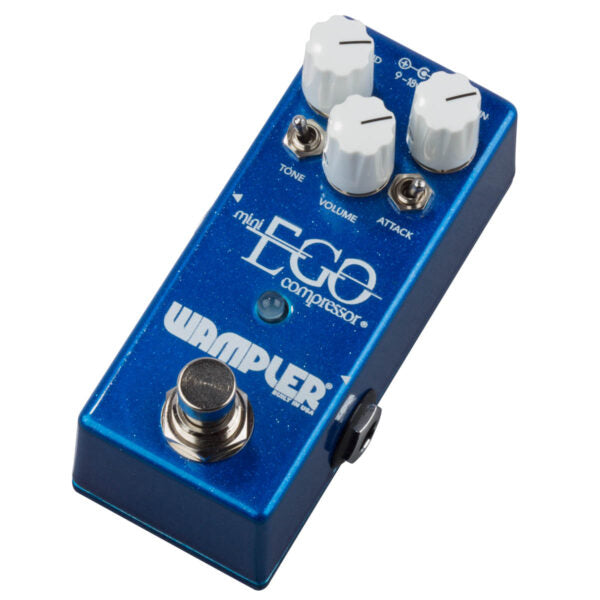 A blue Wampler Mini Ego Compressor guitar pedal with two tone control knobs.