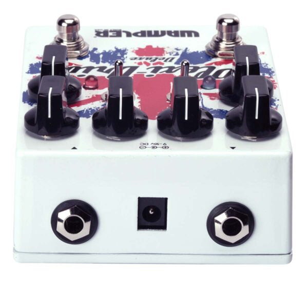 A white Wampler Plexi Drive Deluxe British Distortion pedal with a british flag on it for rock tones.
