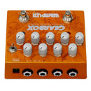 A guitarist's essential Wampler Gearbox Andy Wood Signature Overdrive pedal, boasting four knobs, perfect for refining their electric guitar skills and achieving the desired sound for their album.