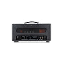 A Bad Cat Jet Black Head amplifier, known as an amp, sits on top of a concrete wall producing powerful sound and adjustable volume levels.