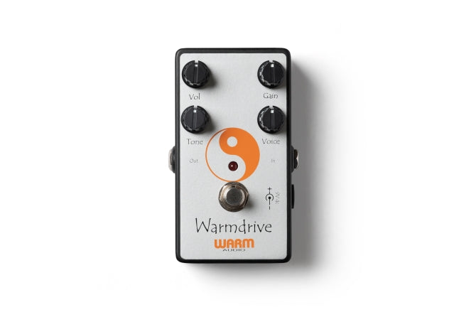Warm Audio Warmdrive Legendary Overdrive Tone Pedal, a guitar pedal, with an orange and white design.