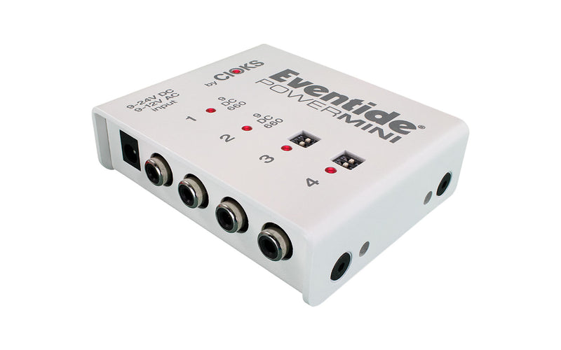 A white Eventide PowerMini Pedalboard Power Supply box with four inputs and four outputs for pedals.