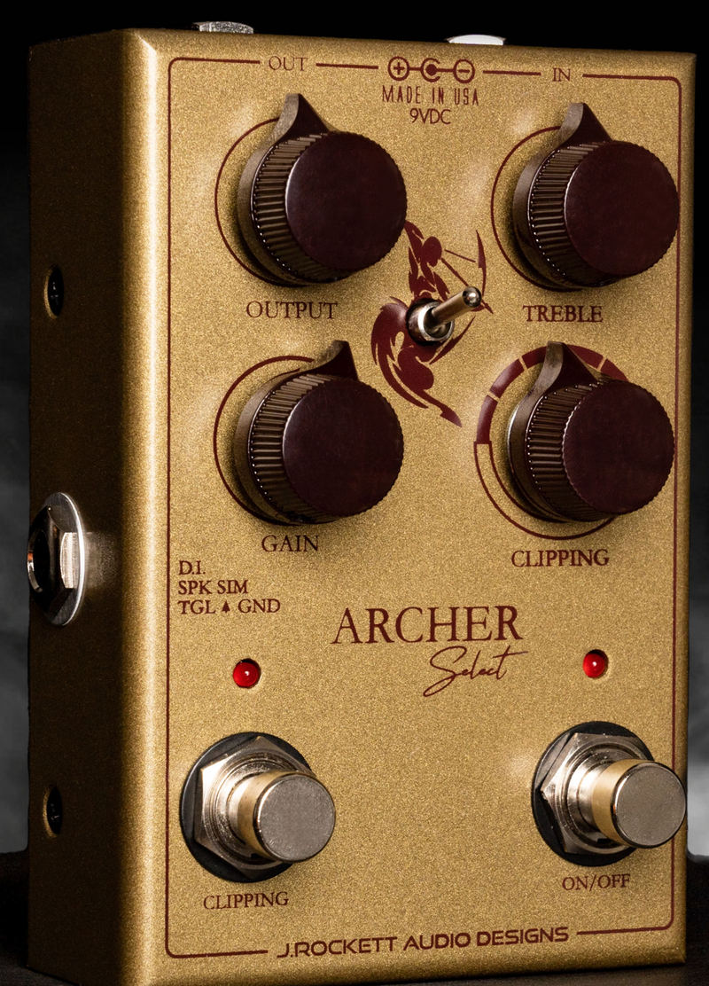 The J. Rockett Audio Designs Ultimate Archer Select is a Klone-style stompbox - a gold pedal with four knobs and diode variations.