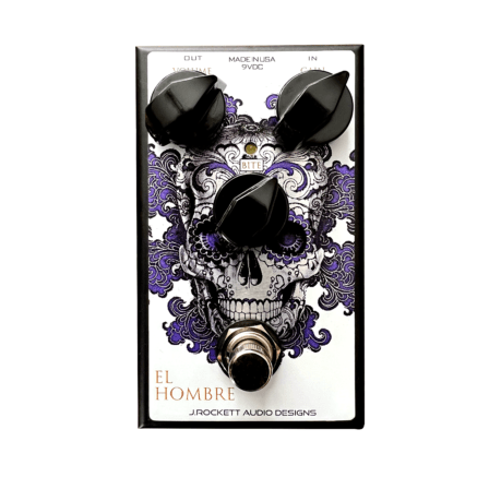 The J. Rockett Audio Designs El Hombre Overdrive is a purple and black overdrive pedal with a skull on it.