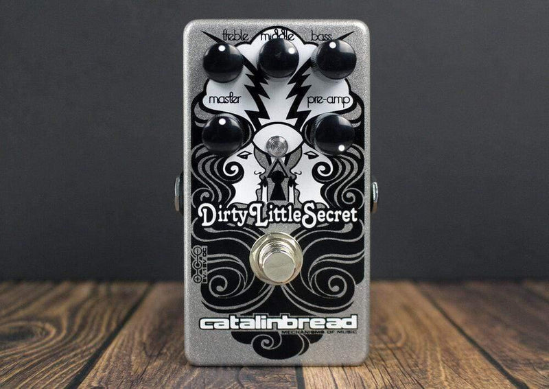 A Catalinbread Dirty Little Secret MKIII Overdrive Distortion guitar pedal that pairs perfectly with British stacks and Marshall amps, making it an essential component for rock and roll enthusiasts.